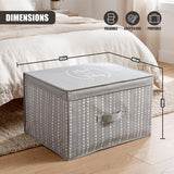 A gray fabric storage box with a heart pattern and "Neat and Tidy" on the lid, placed on a wooden floor near a bed