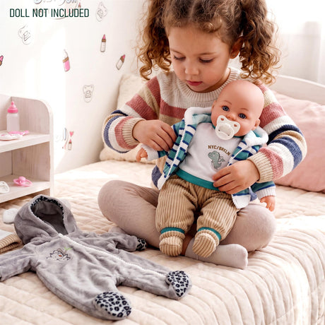 Grey plush koala costume and matching striped doll outfit are displayed next to a seated doll.