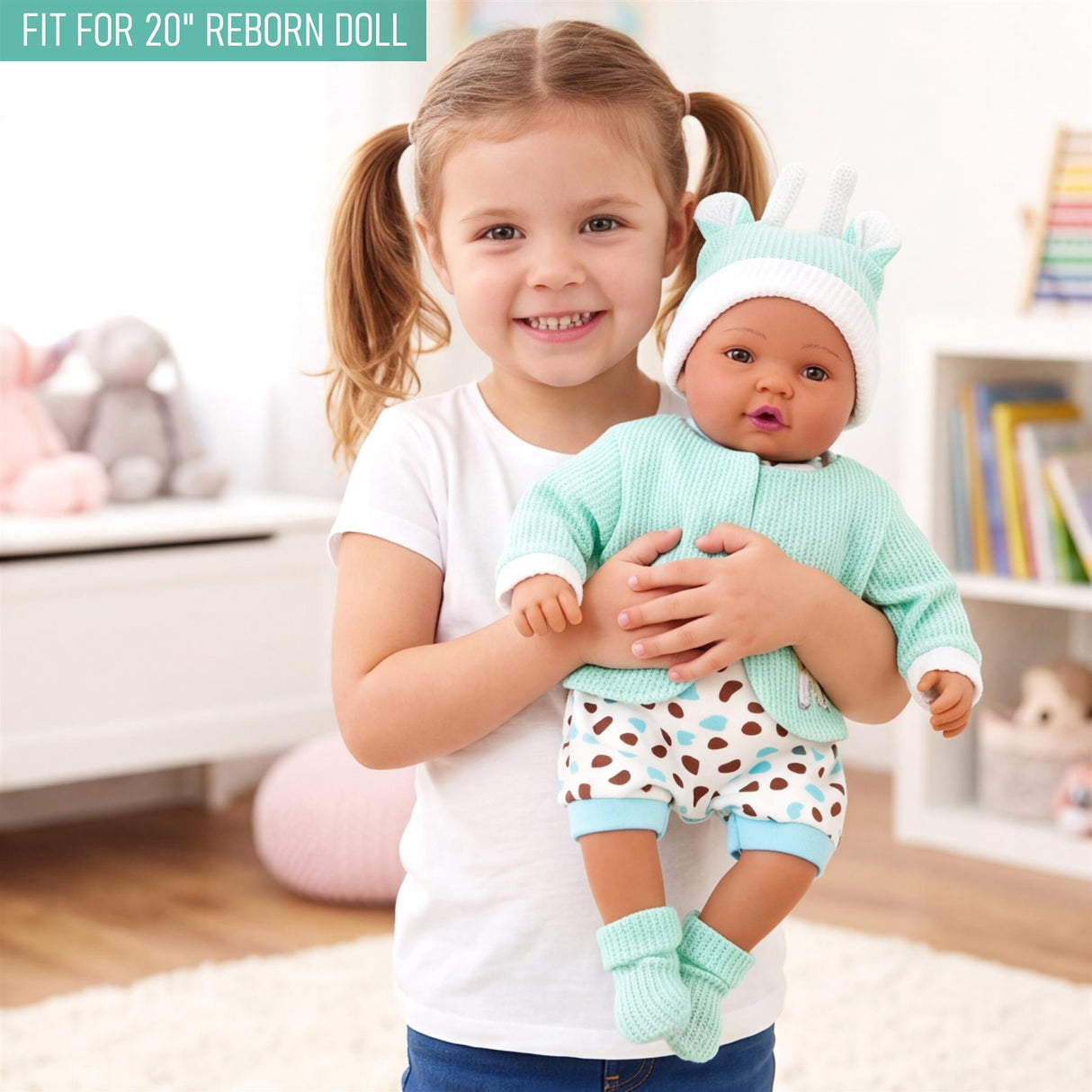 A doll outfit set featuring a mint green jacket, patterned pants, and white booties for reborn dolls.