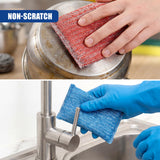 A hand wearing a glove scrubs a pot with a red sponge and cleans a faucet with a blue scouring pad.