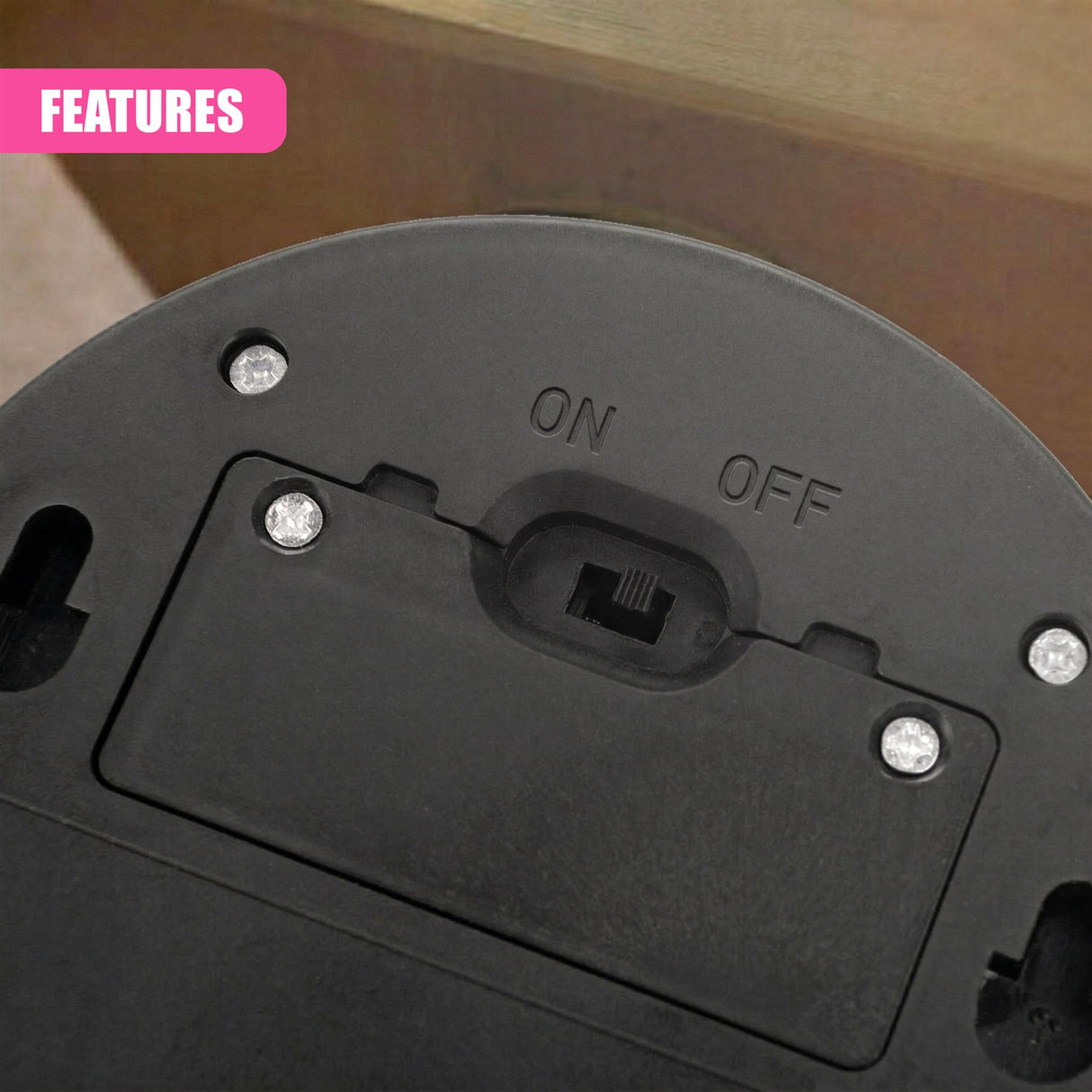 Black fixture showing an on/off rocker switch and visible mounting screw holes for installation.