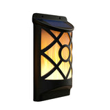 Wall-mounted solar lantern featuring a black frame and artificial yellow flame display.