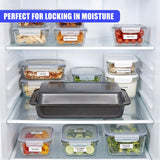 Various airtight food storage containers and a deep roasting tin displayed on shelves.
