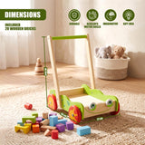 A wooden baby walker toy stands next to numerous colorful wooden building blocks.