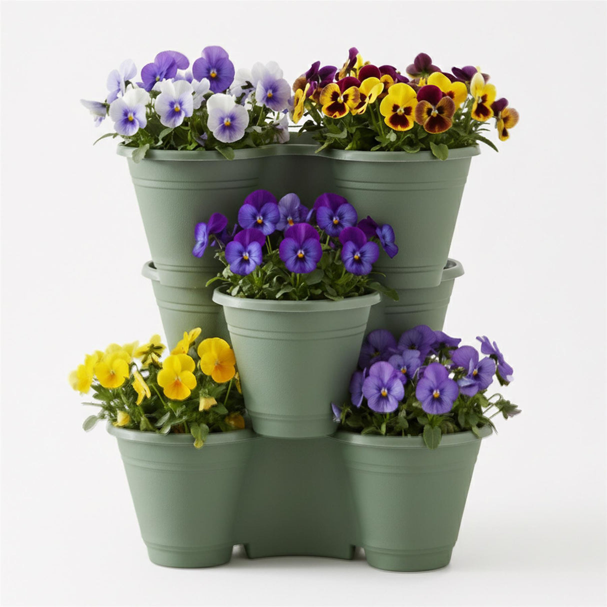 Three stacked green planters display vibrant arrangements of mixed yellow and purple flowers.
