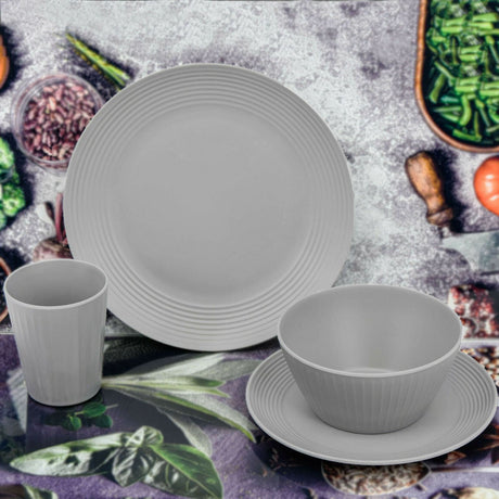 Set of three white bowls on display.