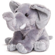 Soft light gray plush toy elephant sitting down, featuring large floppy ears and a distinct trunk.