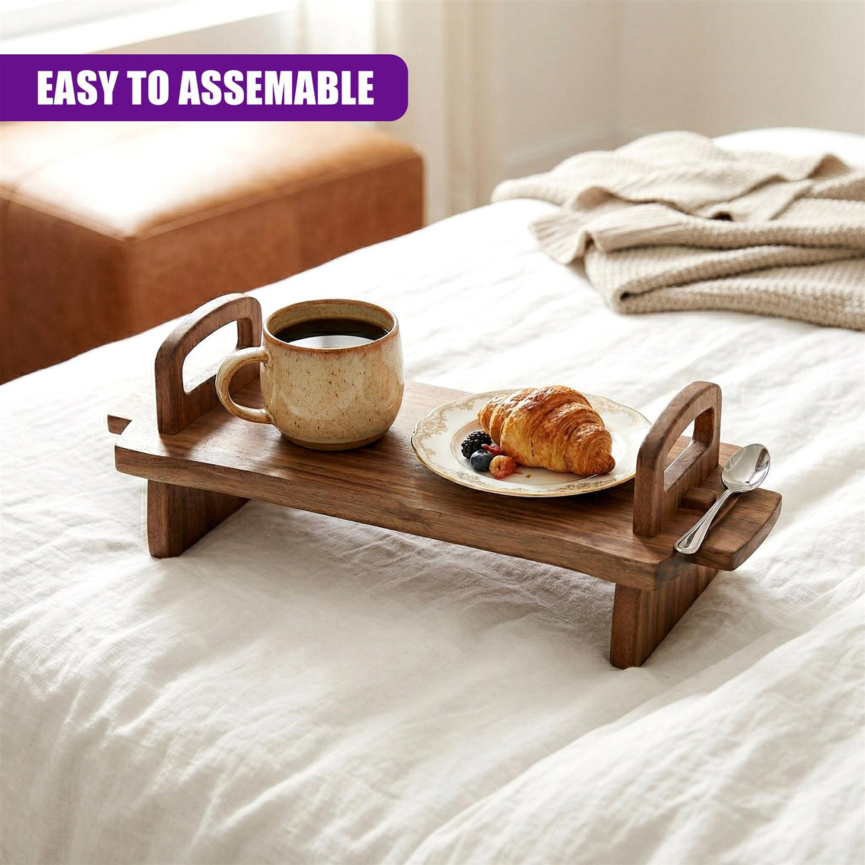 Acacia wood platter holding a mug, a plate with a croissant, berries, and a spoon.