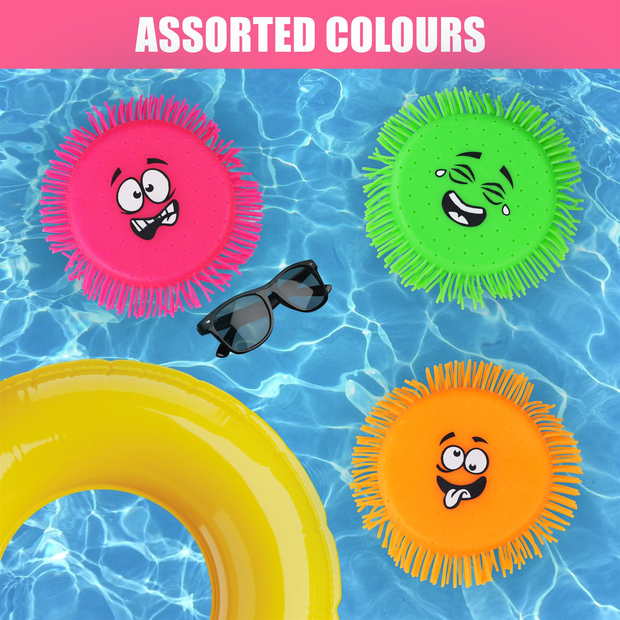 Three multi colored flying disc toys in a swimming pool.