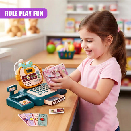 A young girl plays with a toy cash register, holding a purse and smiling. The register has a digital screen and a cash drawer. In the background, a toy shopping cart is visible. The scene is set in a child-friendly, colorful environment. - UKBuyZone