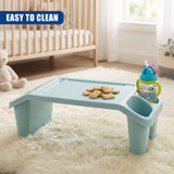 Blue and white baby changing table in a nursery, next to a toy bear. - UKBuyZone