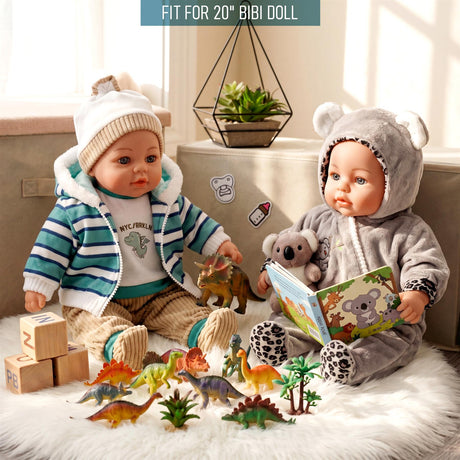Two dolls sit with toys, blocks, and a book, surrounded by miniature plastic dinosaurs and accessories.
