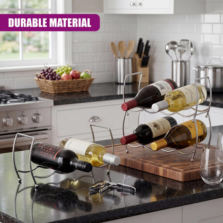 A tiered metal wine storage rack holds several wine bottles on a dark kitchen countertop.
