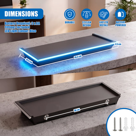 Black floating shelf with blue LED light strip and mounting hardware shown on a countertop