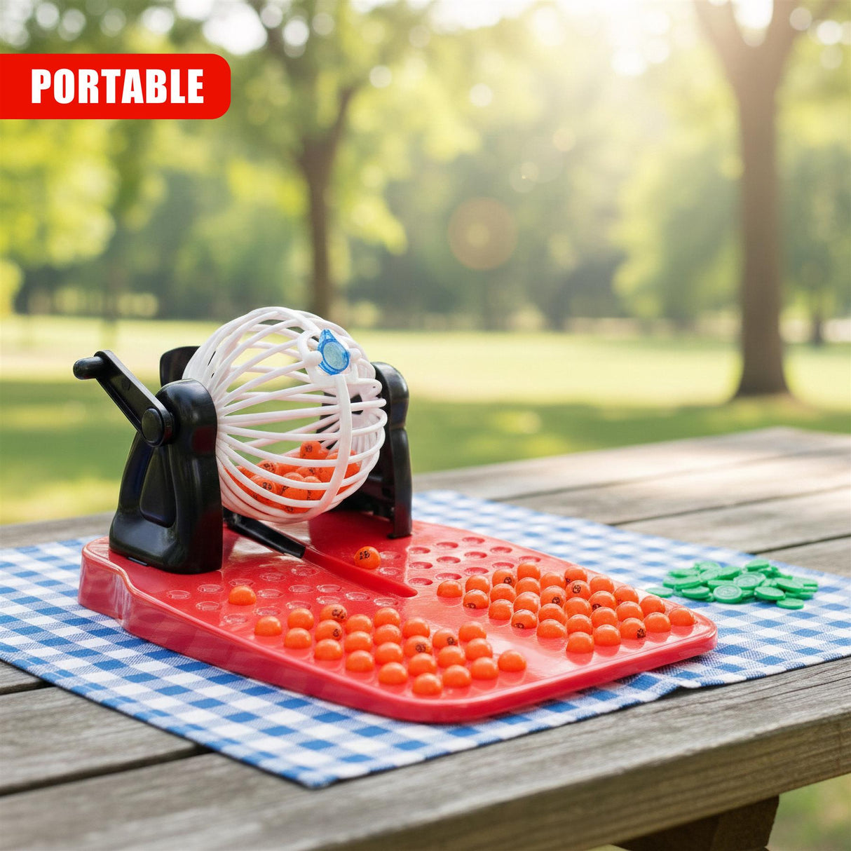 Bingo game set featuring a spinning drum, red marker tray, and visible playing tokens.