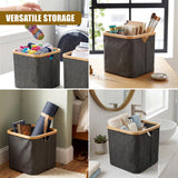 Gray collapsible hamper used for laundry, toiletries, and linens on bathroom and laundry counters.