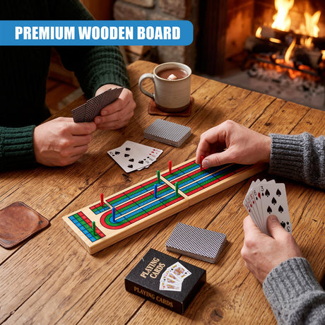 Two people play a wooden cribbage board game on a table near a fire