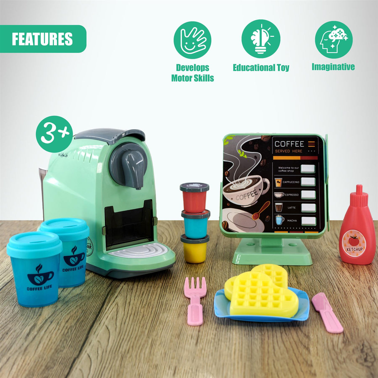 A toy coffee machine and various play food items, including a waffle, ketchup, and a fork, on a wooden table. - UKBuyZone