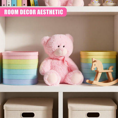 A child's playroom or nursery storage solution, featuring a pink teddy bear, colorful storage bins, and a wooden rocking horse, with a white background and a few toys on the shelves. - UKBuyZone
