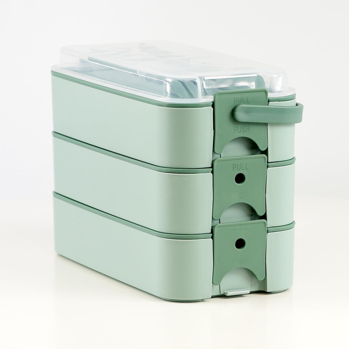 Three compartment lunch box in teal color.