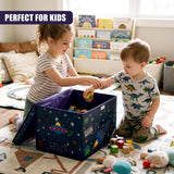Two children play with toys from a large space-themed storage box on a rug in a bright room