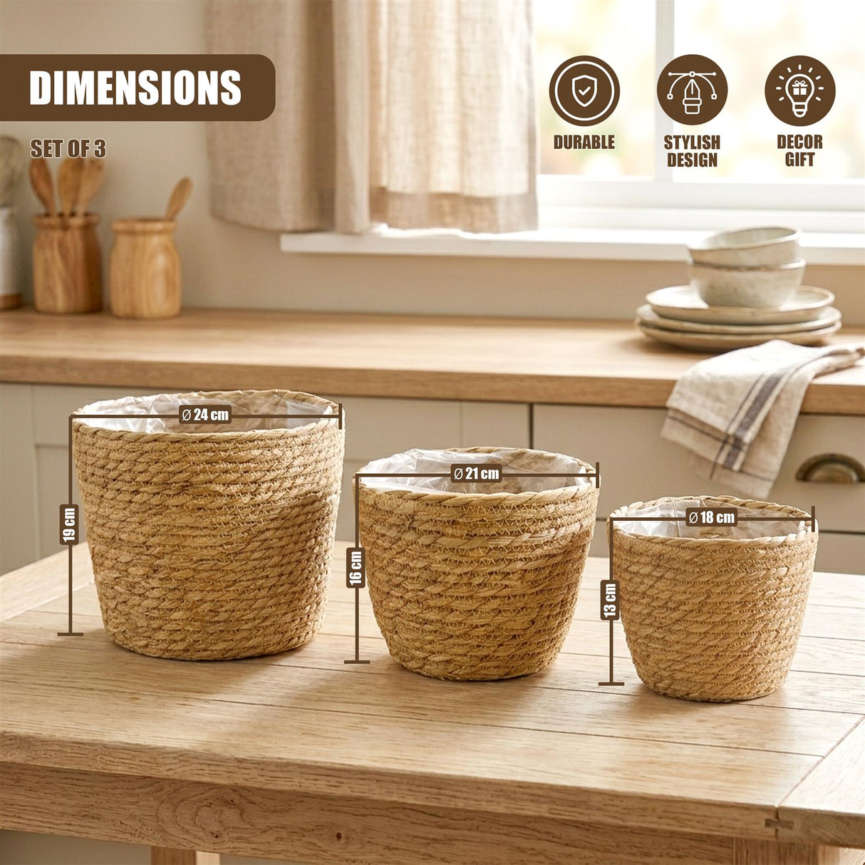 A set of three woven wicker planters in varying sizes are arranged on a light wooden surface.