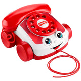 Red and white toy phone featuring a keypad, facial details, and attached coiled cord.