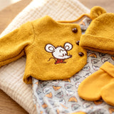 Yellow knit doll clothing set includes a sweater with a mouse design, matching hat, and mittens.