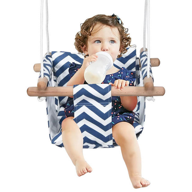 baby in wooden swing with chevron fabric - UKBuyZone