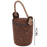 A rope attached to a wooden handle on top of a brown, rough-textured fabric base, hanging from a hook. - UKBuyZone
