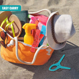 Several light blue plastic clips sit next to an orange beach tote filled with summer accessories.