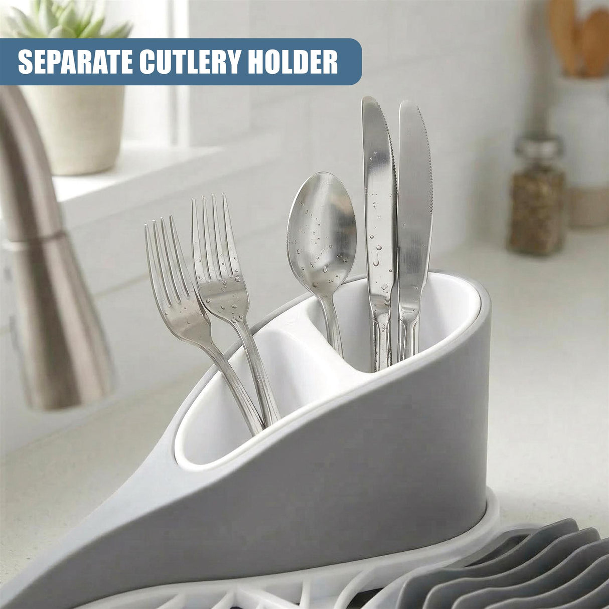 Countertop utensil holder containing forks, spoon, and knife rests on a drying rack.