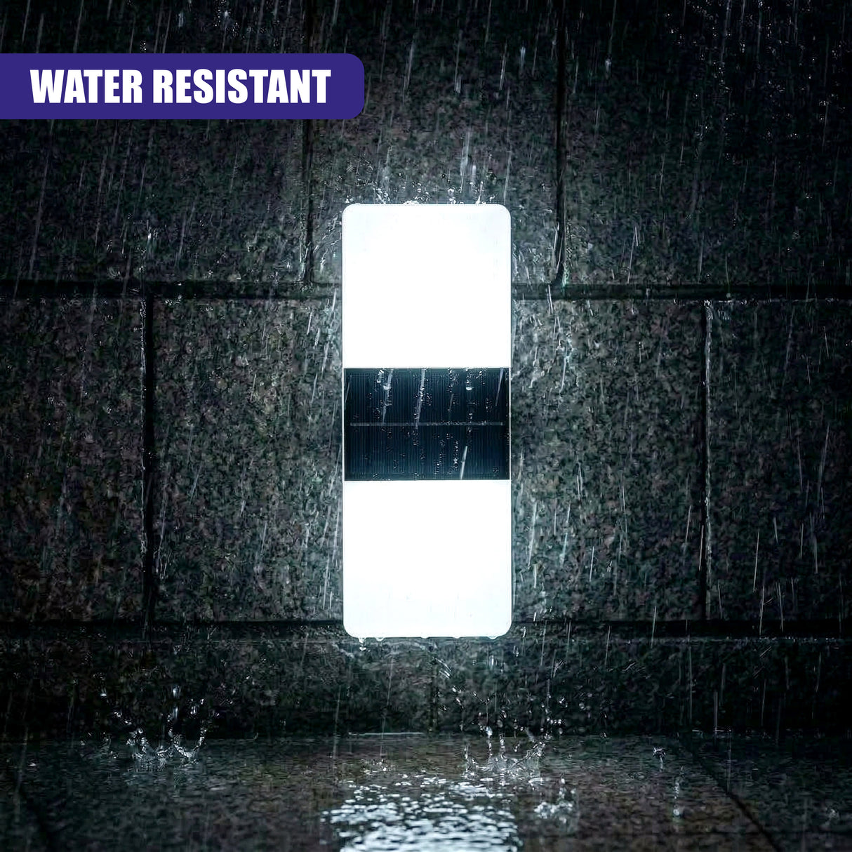 Illuminated rectangular wall light with a central dark panel, mounted on wet, textured masonry.
