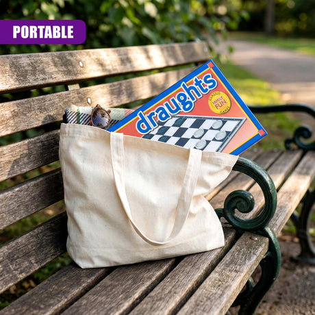 A canvas tote bag rests on a wooden bench, holding a folded draughts game board.