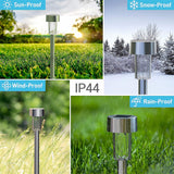 Modern staked outdoor lantern light shown across various environments, including sun, rain, and snow.