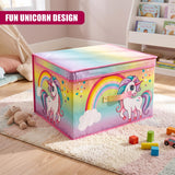 Rainbow Unicorn Storage Box from The Magic Toy Shop sits on a rug surrounded by toys and books in a child's room