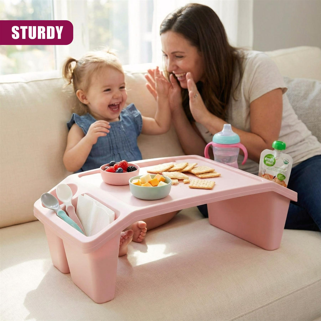A child's feeding tray with storage compartments, featuring a playful pink design. - UKBuyZone