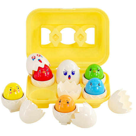 Yellow plastic egg carrier holding several bright, cartoon-style toy eggs for children.