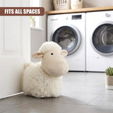 Sheep door stopper features a textured white body and smooth beige head resting against a door.