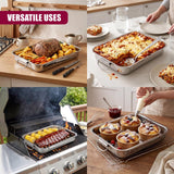 Multiple stainless steel trays used for roasting meats, baking casseroles, and presenting various baked goods.