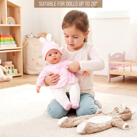 A girl plays with a doll in pink clothes, a stuffed bear, and a plush bunny toy.
