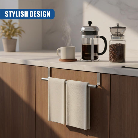 Metal towel rack mounted on wooden cabinet, supporting two stacked, folded white cloths.