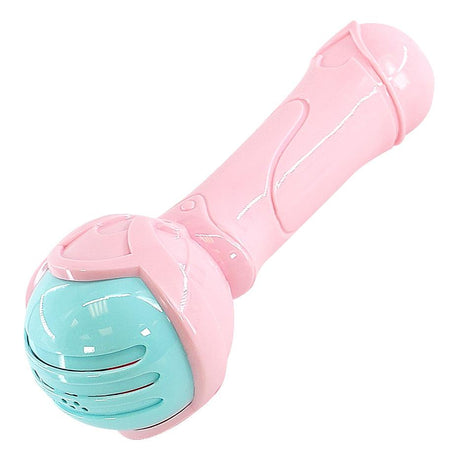 A pink, handheld, battery-powered device with a blue, round, rotating head and a pink, curved, handle-like body. - UKBuyZone