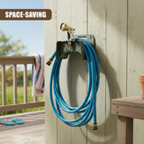 A dark metal hose holder with a spigot and a coiled blue garden hose mounted on wood siding.