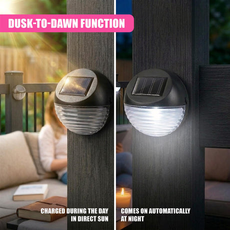 Black solar fence lights with solar panels are mounted on two vertical wood posts.
