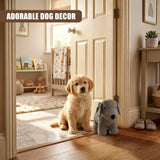 A golden puppy sits next to a stuffed grey dog door stopper on the hardwood floor.
