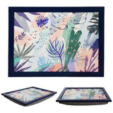 A colorful, rectangular tray with a vibrant, abstract design featuring various plants and a cactus. The tray has a sturdy, black frame and a flat, square base. - UKBuyZone