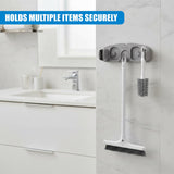 Wall-mounted holder displaying a mop and a separate hanging brush for bathroom cleaning supplies.