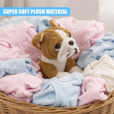 A plush British Bulldog toy positioned among folded pastel baby outfits in a basket.