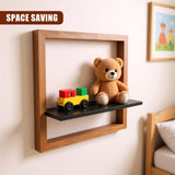 A small, square wooden shelf attached to a wall. On it sits a charming toy teddy bear and a vibrant children's book. The shelf provides a fun and functional addition to any room, perfect for keeping favorite toys or books within easy reach. - UKBuyZone